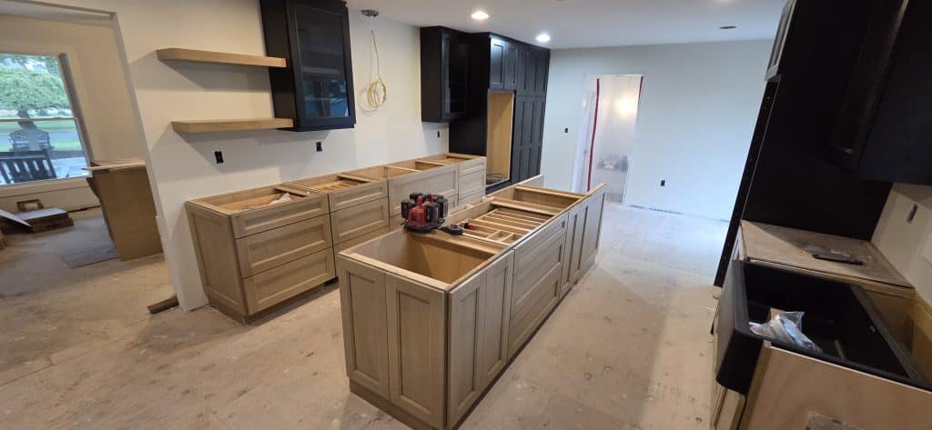 kitchen remodel in progress courtesy of Carpentry 1, cabinets and drawers on floor